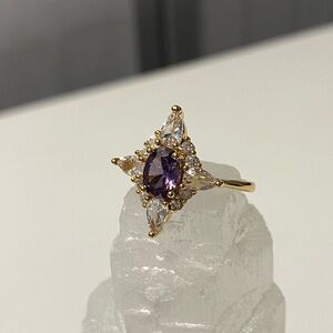 Gold Plated with Amethyst purple coloured middle stone ring - size 7